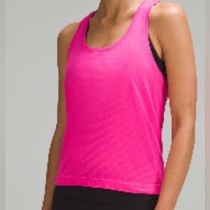 Swiftly Tech Racerback Tank Top

2.0 *Race Length In Sonic Pink Size 6